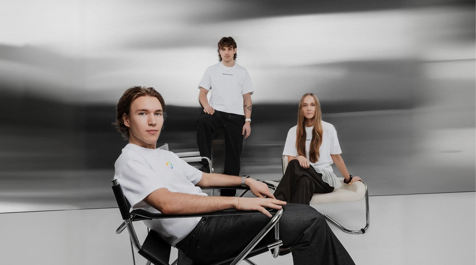 Dezain Studio founders in a modern studio portrait